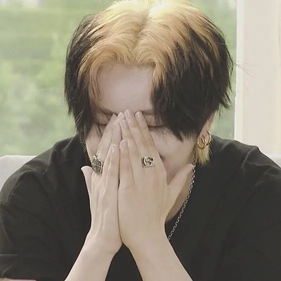 black men's medium curtain cut with ash blonde ghost roots.