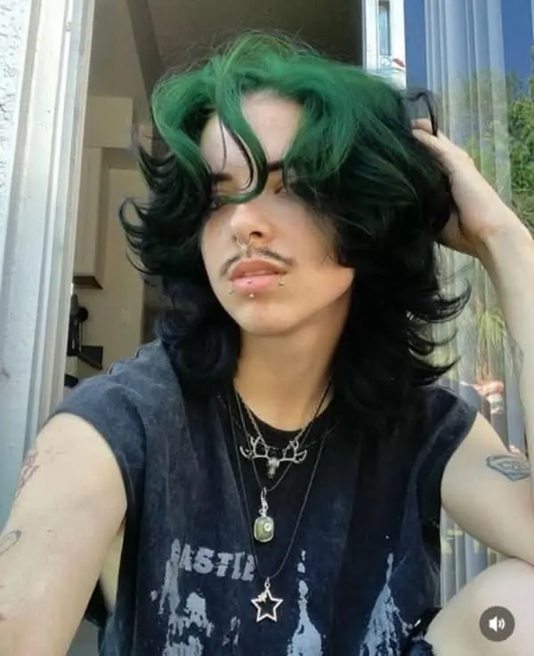 black men's shag mullet with neon green ghost roots.