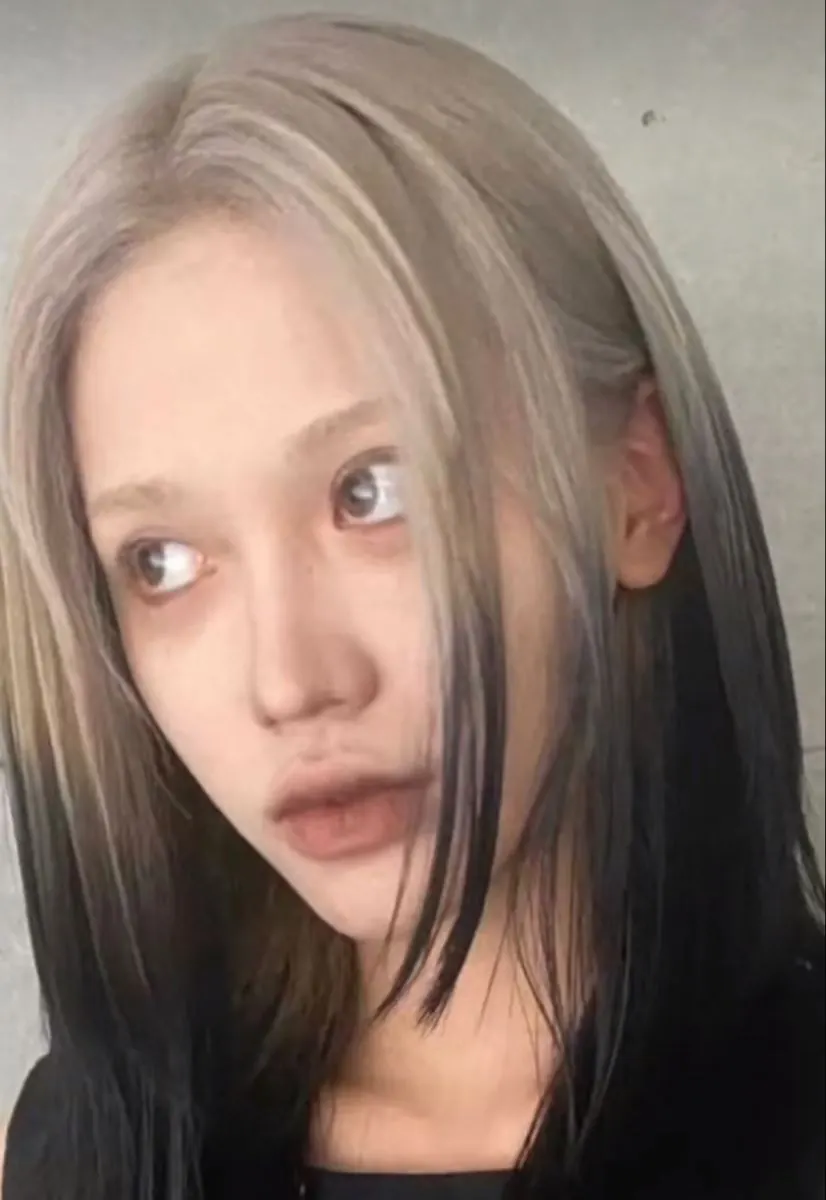 Black hair with Mushroom Blonde ghost roots, Medium Straight Layered, Front Portrait.