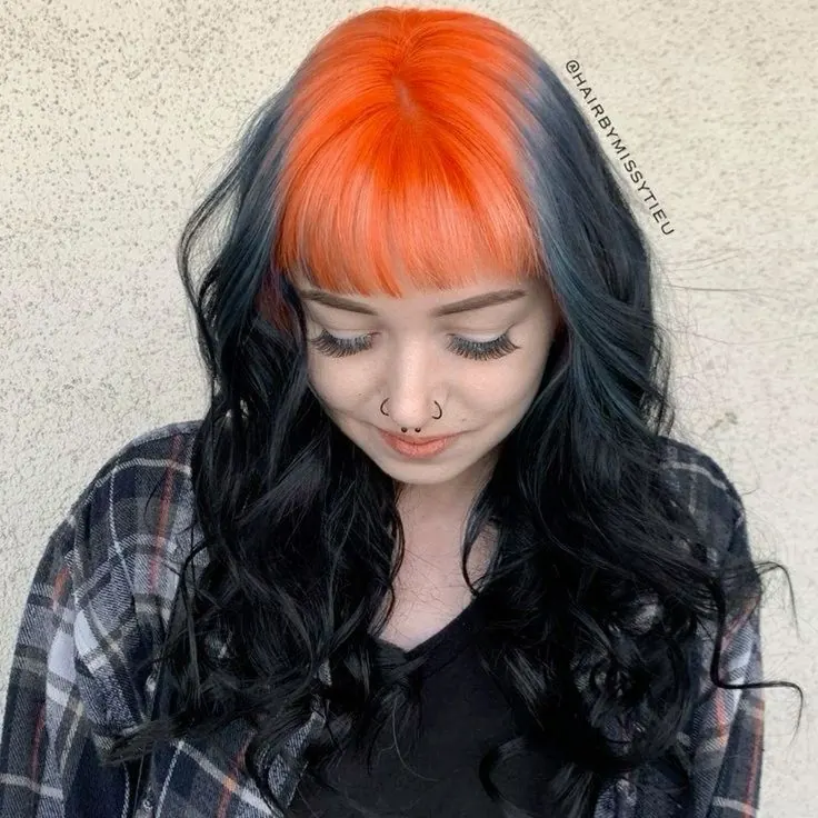 Black hair with Orange Copper ghost roots, Medium Curly Wave, Front Portrait.
