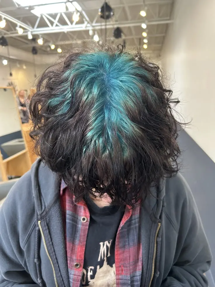 Black hair with Teal Blue ghost roots, Short Curly Shag, Top View.