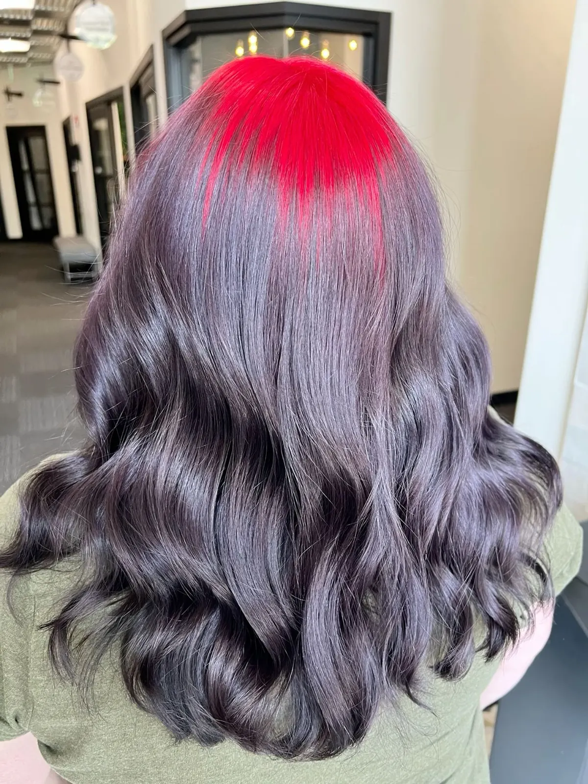 Soft mauve-lavender waves with a hot pink ghost-root panel across the crown.