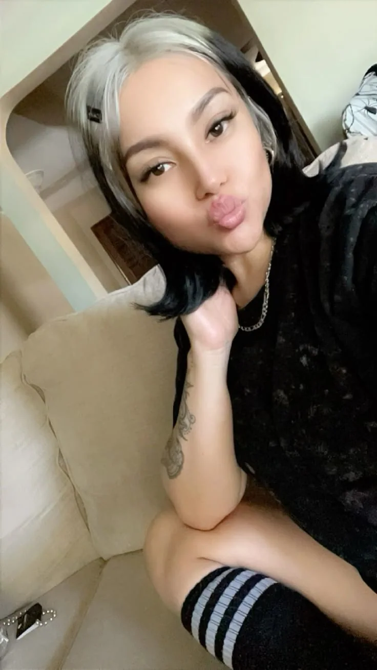 Black hair with Silver White ghost roots, Short Sleek Bob, Selfie.